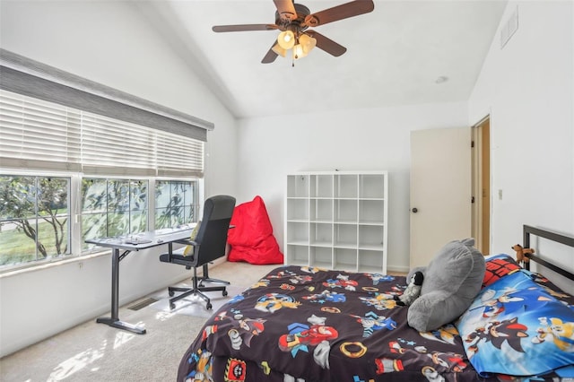 carpeted bedroom featuring vaulted ceiling and ceiling fan