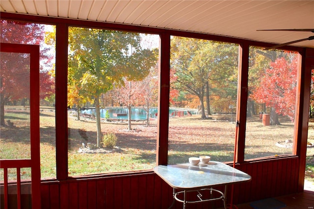 unfurnished sunroom featuring a wealth of natural light