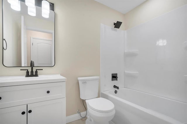 full bathroom with shower / tub combination, vanity, and toilet