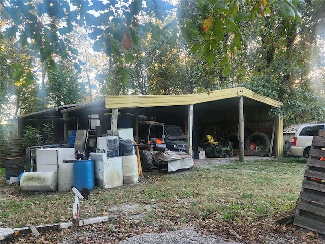 exterior space featuring a carport