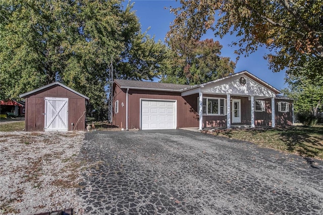 single story home with a garage