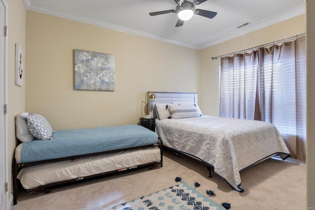 bedroom with ceiling fan and crown molding