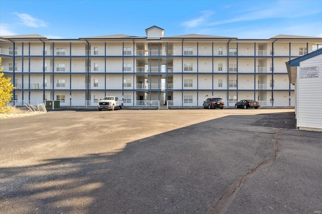 view of property featuring central AC unit