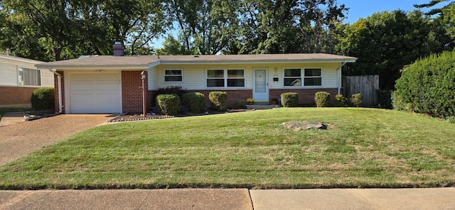 ranch-style house featuring a front yard and a garage