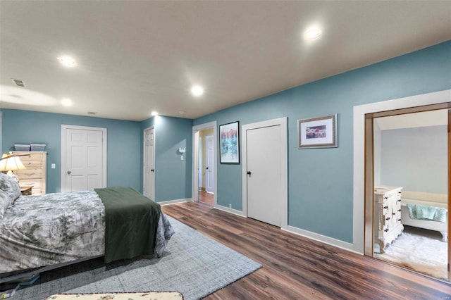 bedroom featuring dark hardwood / wood-style floors