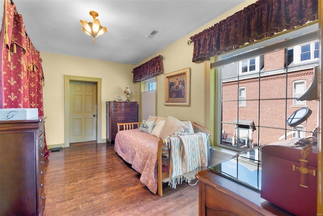 bedroom featuring dark wood-type flooring