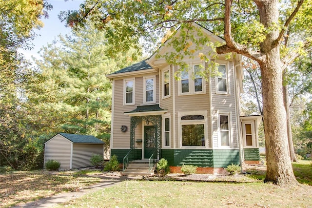 view of front of house featuring a shed