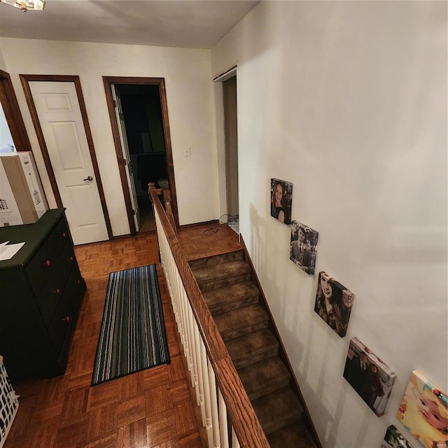 hall with dark parquet flooring