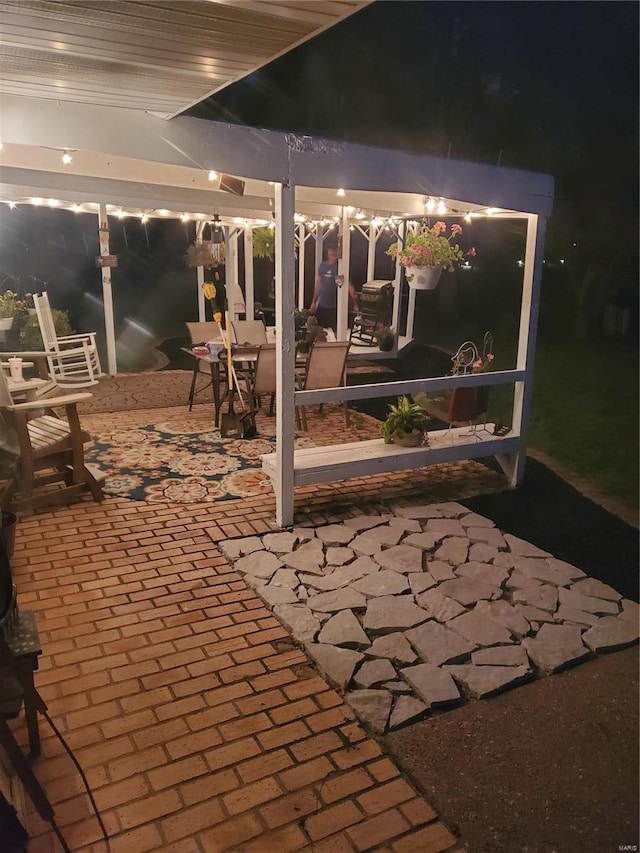 view of patio at twilight