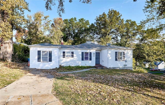 ranch-style home with a front yard