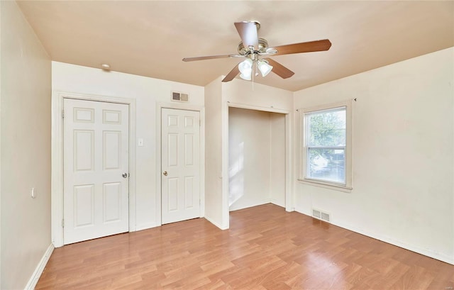 unfurnished bedroom featuring light hardwood / wood-style floors and ceiling fan