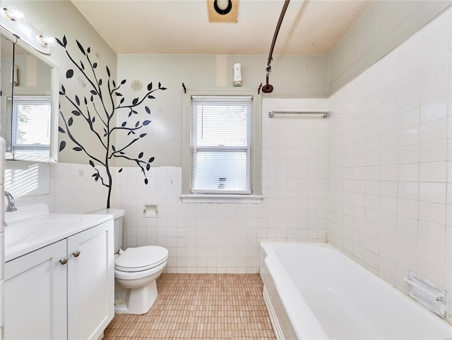 bathroom featuring a wealth of natural light, tile walls, toilet, and a bath