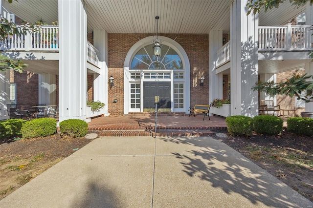 doorway to property with a balcony