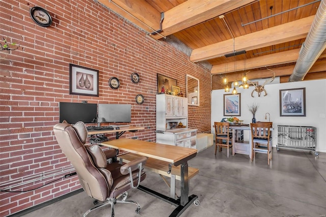 home office with concrete floors, a chandelier, beamed ceiling, and wooden ceiling