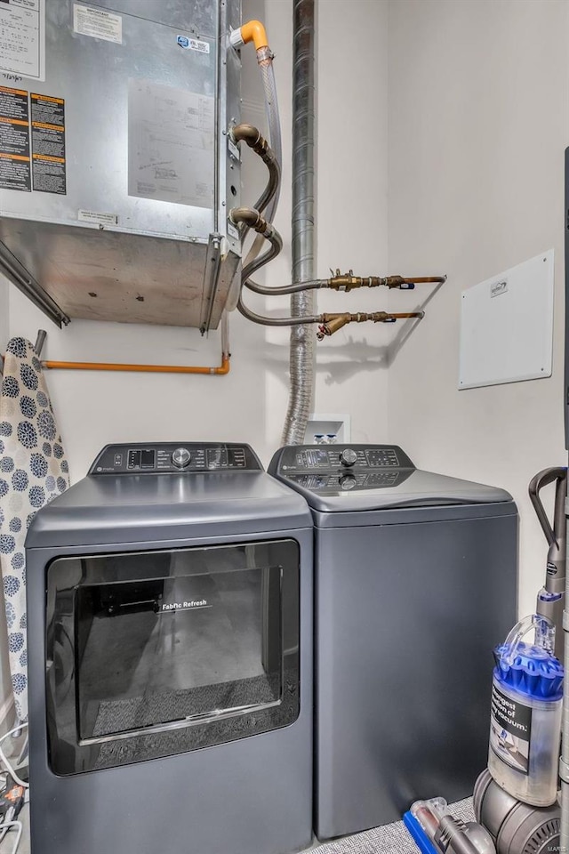 laundry area featuring washing machine and dryer