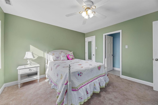 carpeted bedroom with ceiling fan