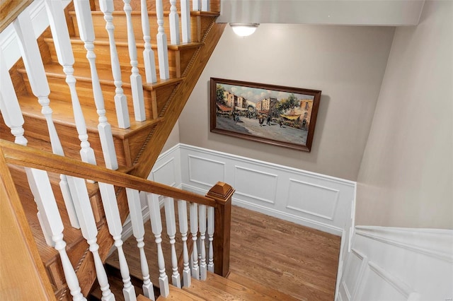 stairway with wood-type flooring