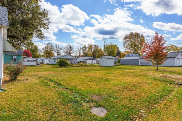 view of yard with a storage shed