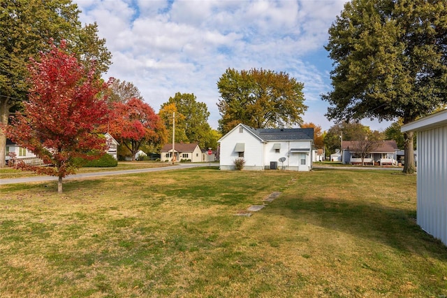 view of yard featuring a garage