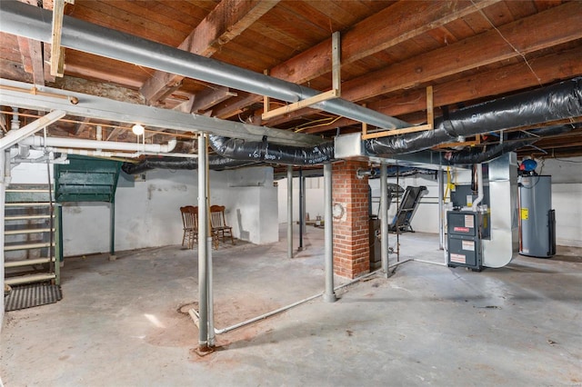 basement featuring water heater and heating unit