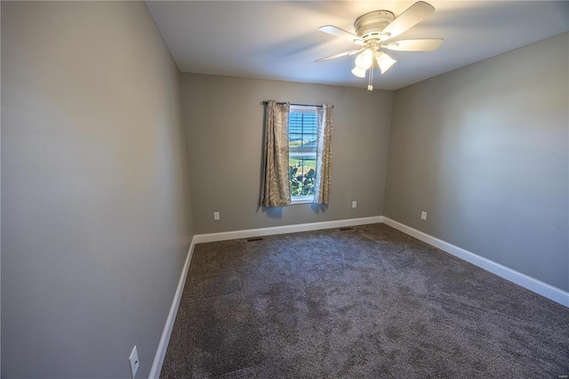 carpeted empty room with ceiling fan