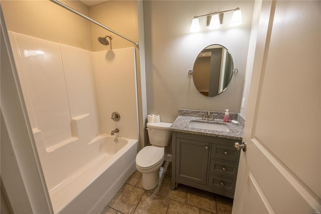 full bathroom featuring vanity, tub / shower combination, and toilet