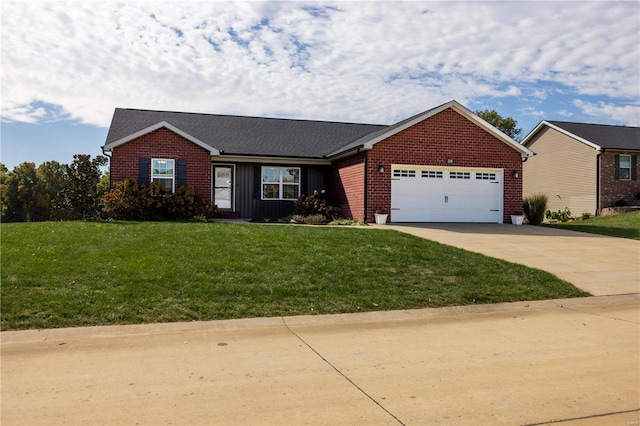 ranch-style home with a front lawn and a garage