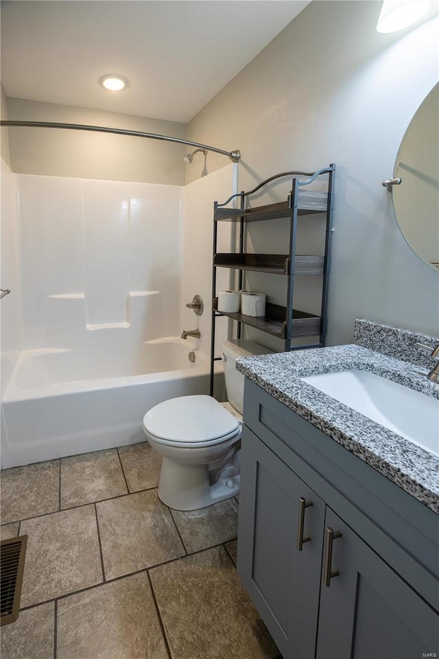 full bathroom with vanity, shower / washtub combination, and toilet