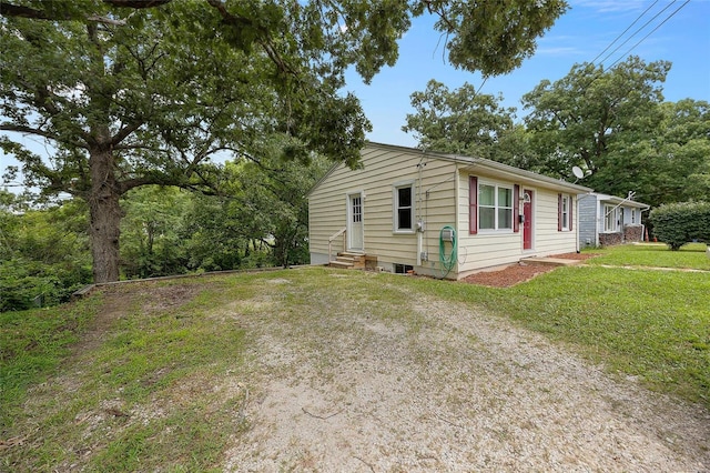 view of front of home with a front yard