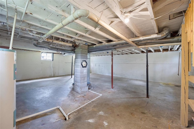 basement featuring water heater