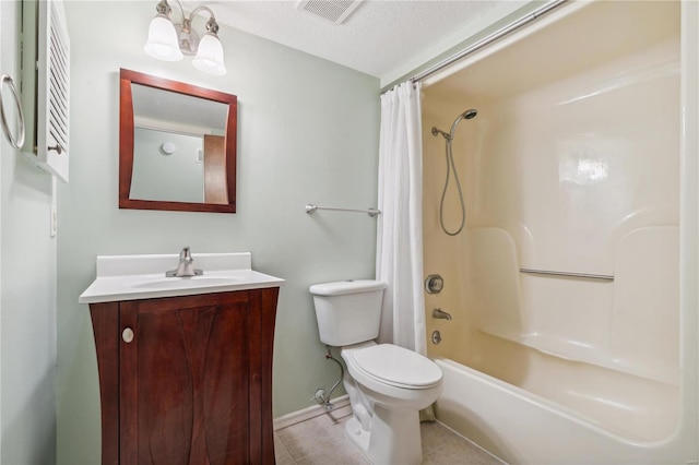 full bathroom featuring toilet, tile patterned flooring, a notable chandelier, a textured ceiling, and shower / tub combo with curtain