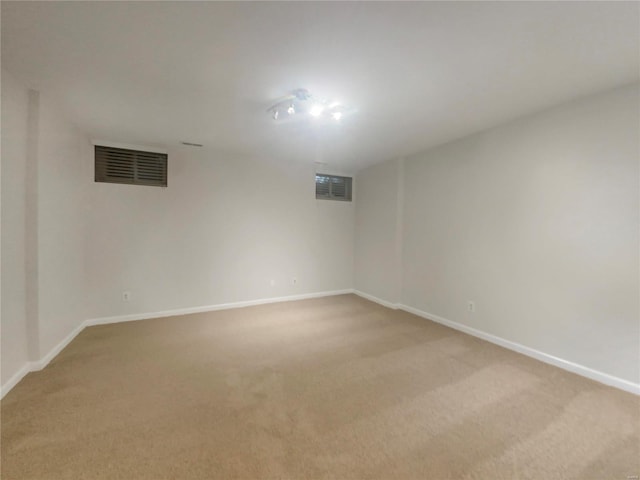 basement featuring carpet flooring