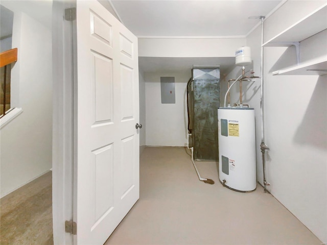 utility room featuring electric water heater and electric panel