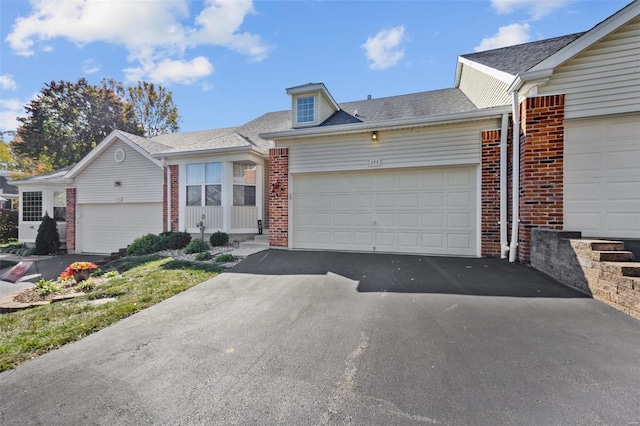 ranch-style home with a garage