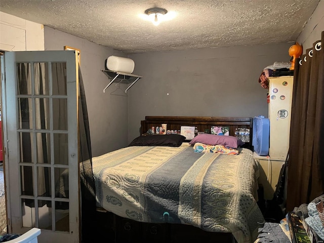 bedroom with a textured ceiling