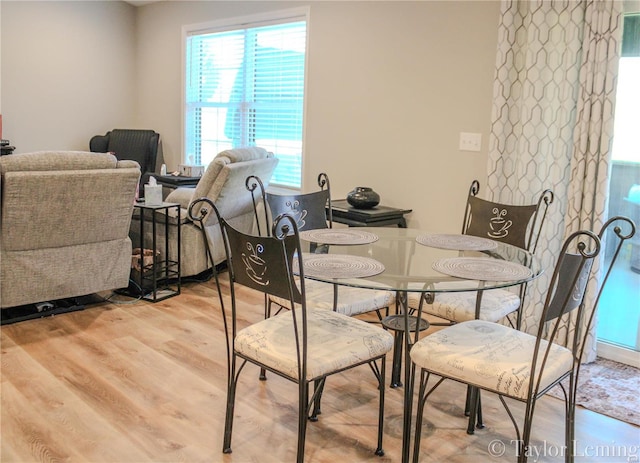 dining room with light hardwood / wood-style floors