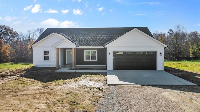 modern farmhouse style home featuring a garage