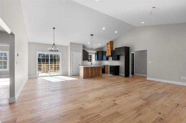 kitchen with a center island, light hardwood / wood-style floors, and a wealth of natural light