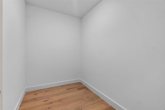 spare room featuring hardwood / wood-style floors