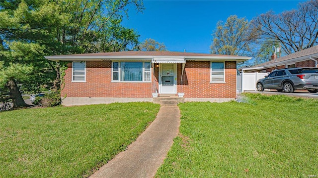 view of front of home with a front lawn