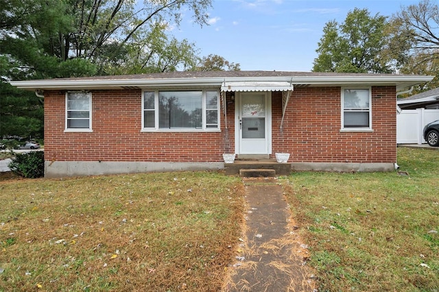 view of front facade with a front lawn