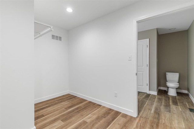 interior space with hardwood / wood-style flooring