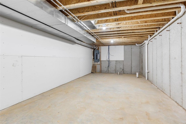 basement featuring electric panel