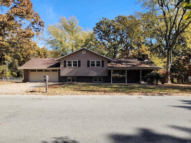 split level home featuring a garage