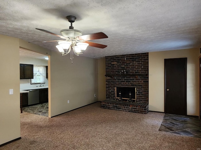 unfurnished living room featuring a fireplace, light carpet, a textured ceiling, and ceiling fan