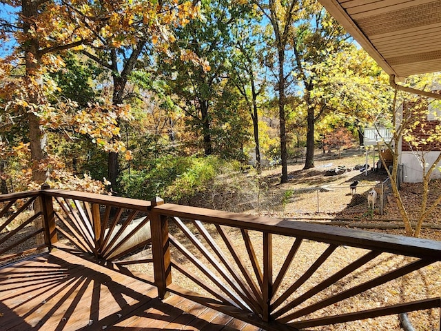 wooden balcony featuring a deck