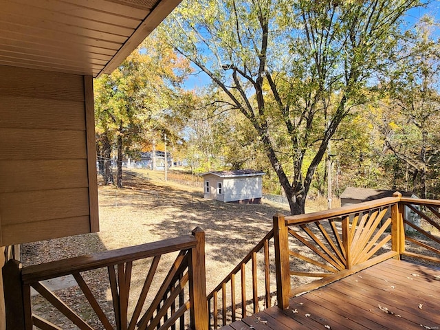 deck with a storage shed