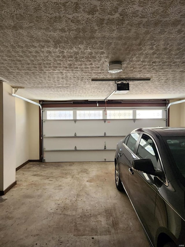 garage featuring a garage door opener