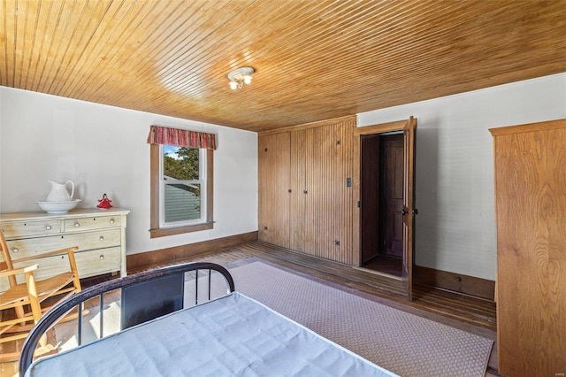 unfurnished bedroom with wooden ceiling