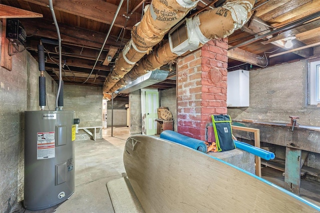 basement featuring electric water heater